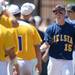 Chelsea senior Chris Boyd congratulates St. Joseph players after losing 7-5 in the quarter final match up at Ray Fisher Stadium on Tuesday. Melanie Maxwell I AnnArbor.com
